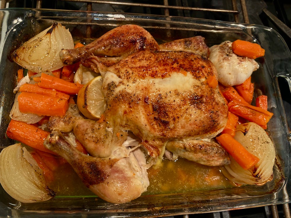 Learn to "broast" a chicken, Roasted chicken with onions, whole garlic, and carrots, 