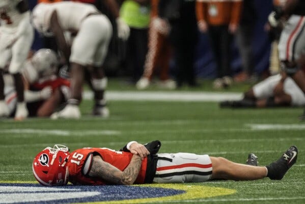 Georgia QB Carson Beck returns from hand injury for final snap in SEC championship OT win over Texas | AP News Georgia QB Carson Beck returns from hand injury for final snap in SEC championship OT win over Texas | AP News