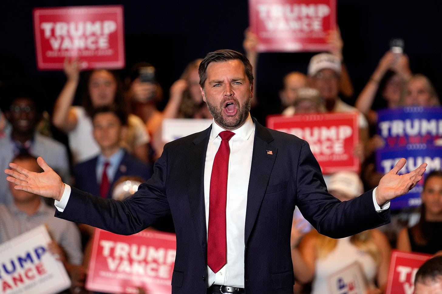 J.D. Vance making a weird face at a Trump rally