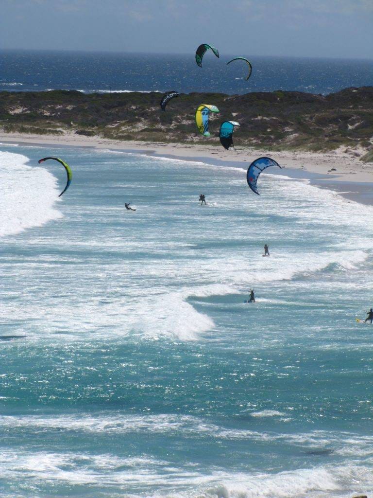 Kite surfers are pulled by powerful winds, leaping high, riding the waves and currents. Why do I travel? To feel the wind on my face, to feel weather in other places, to know the seasons around the globe.
