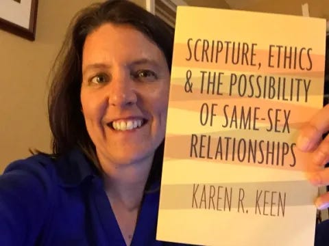 Karen Keen holding her book.