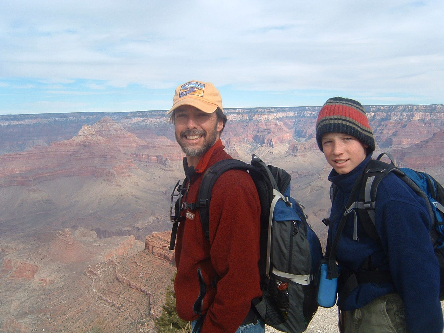 Photo showing author and son at the Grand Canyon