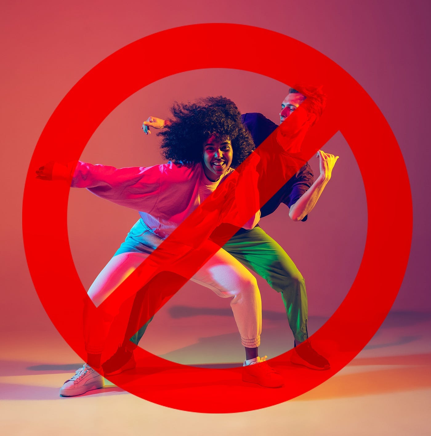 Two dancers with a “banned” symbol in front of them. Two dancers with a “banned” symbol in front of them.