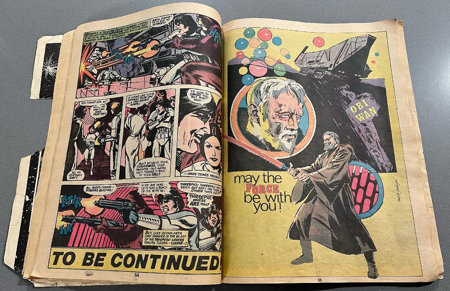 Photo of pages 54 and 55 of my copy of Marvel Special Edition Featuring Star Wars issue no. 3. Page 54 is the conclusion of a chapter. Page 55 is a pin up of Obi-Wan Kenobi.