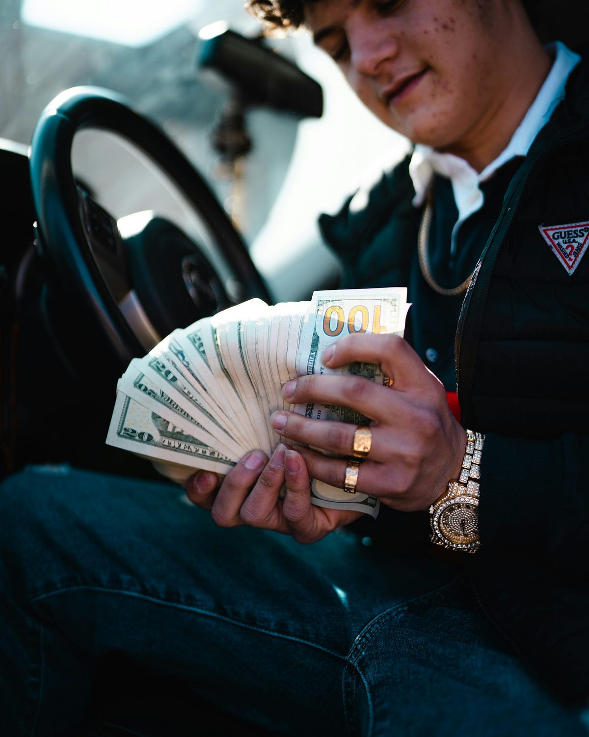 Person looking at notes in hands. Person looking at notes in hands.