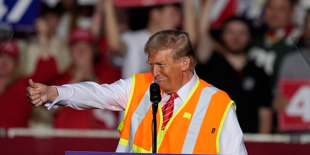 Donald Trump wears garbage worker vest to rally in critical swing state |  Fox News