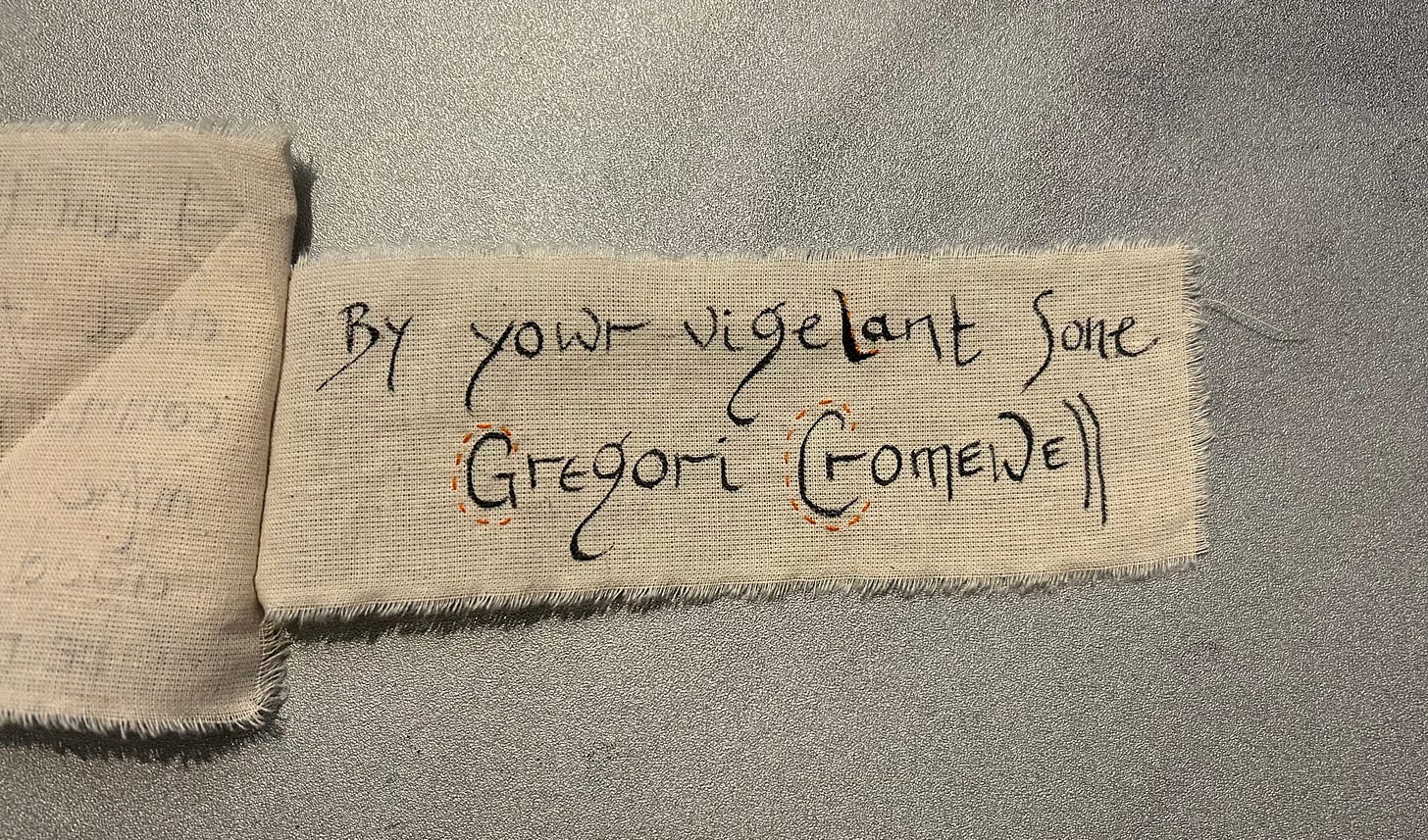 Stitched and inked text reading “By your vigilant son Gregori Cromewell”