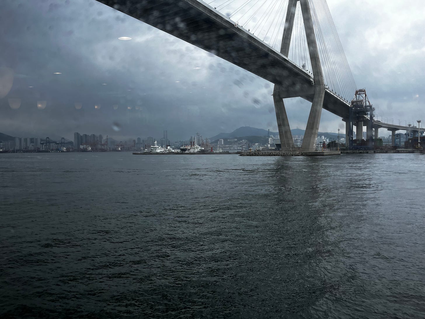 Photo of a concrete bridge over a harbour