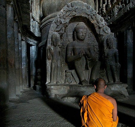 Buddhist Monk inside one of the Ellora Caves Aurangabad, India | Gunther  Deichmann