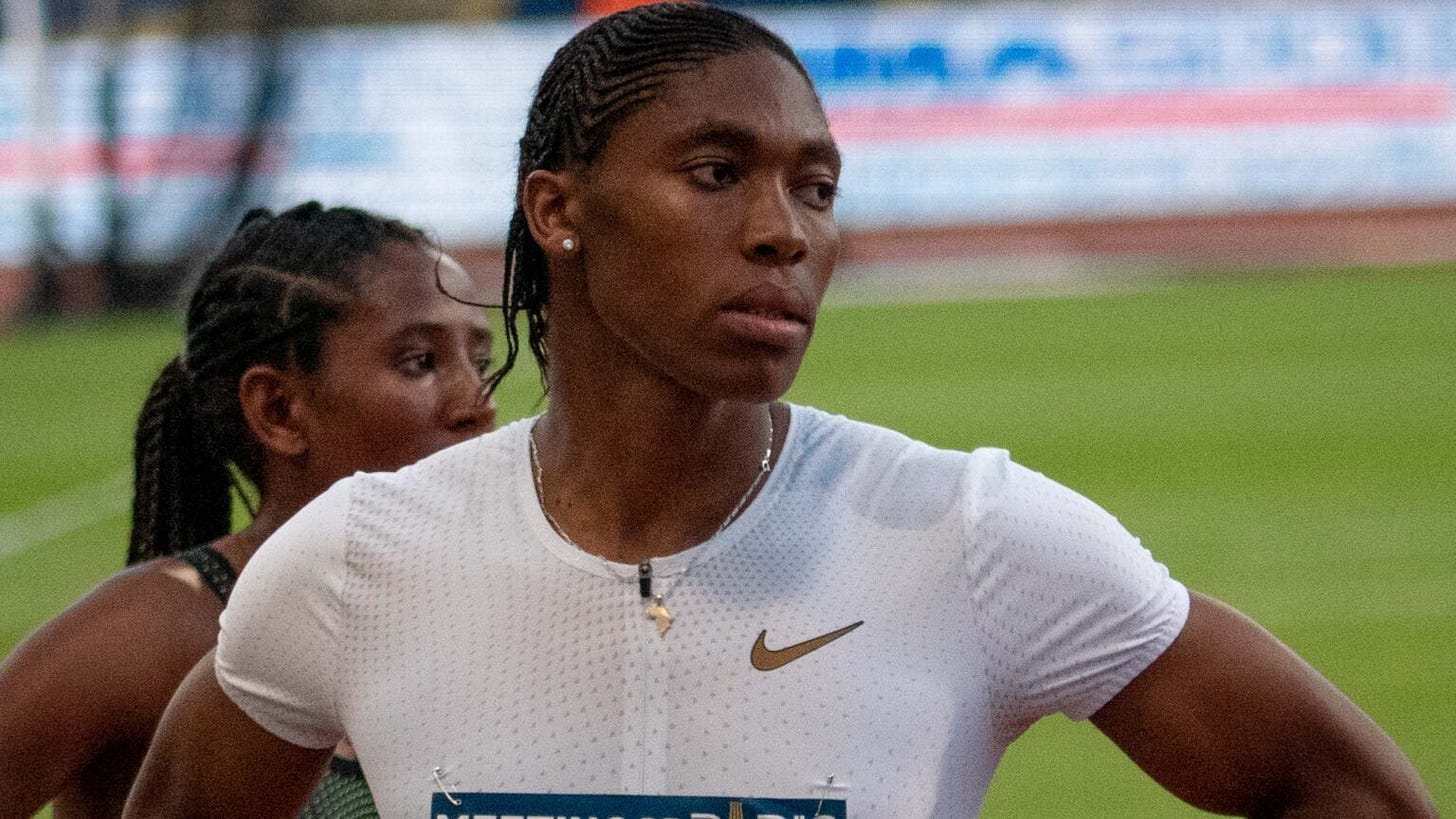 Caster Semenya stands on the playing field in uniform, looking to the side Caster Semenya stands on the playing field in uniform, looking to the side