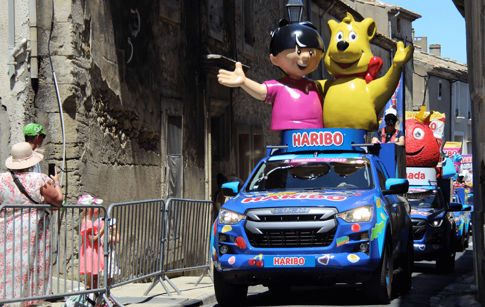 Haribo vehicles topped by cartoon characters in the 'caravan' for the 2021 Tour de France. (c) Chris Aspinall, 2021