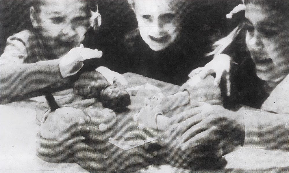 Kids playing Hungry Hungry Hippos in 1978