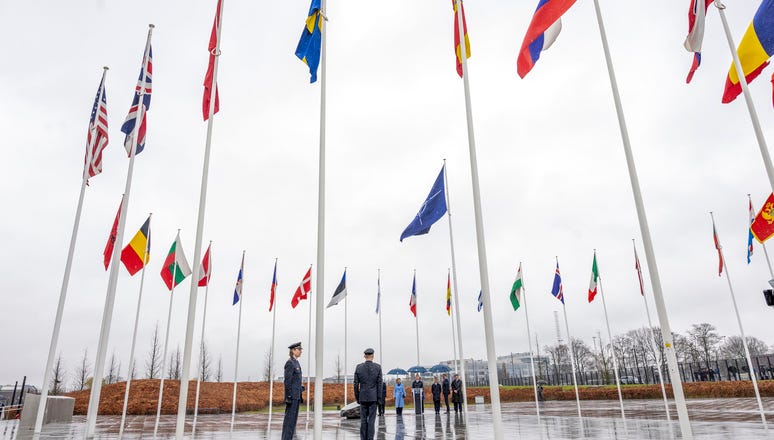 Raising of the flag of Sweden during the Accession Ceremony