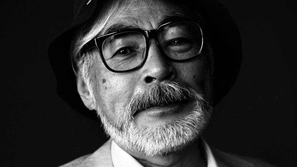 A black-and-white photo of Hayao Miyazaki
