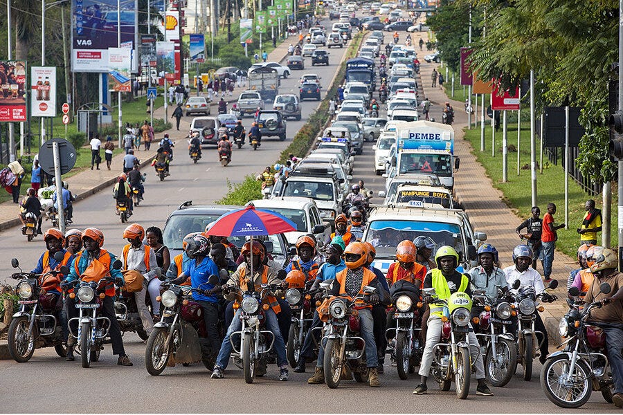 Uganda motorcyle taxis skirt traffic, but also make it worse - CSMonitor.com