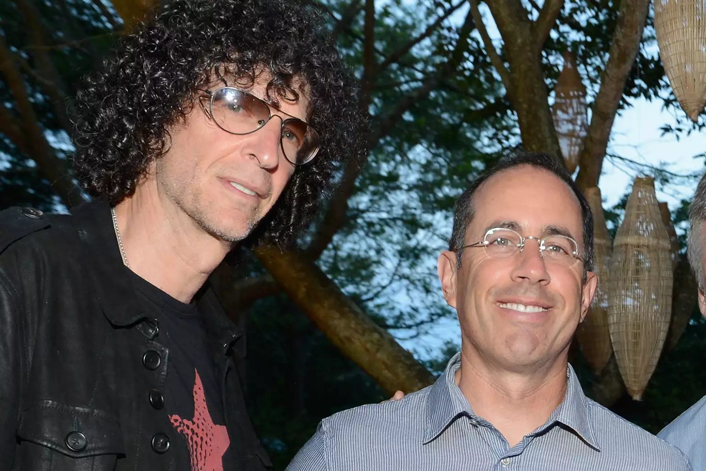 Howard Stern and Jerry Seinfeld attend the Baby Buggy Summer Dinner hosted by Jessica and Jerry Seinfeld and rag & bone on July 27, 2013 in East Hampton, New York. 