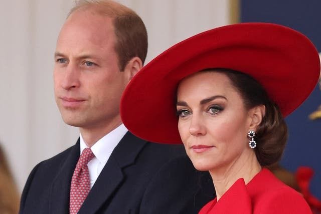 Britain's Prince William, left, and Kate, Princess of Wales, attend a ceremonial welcome
