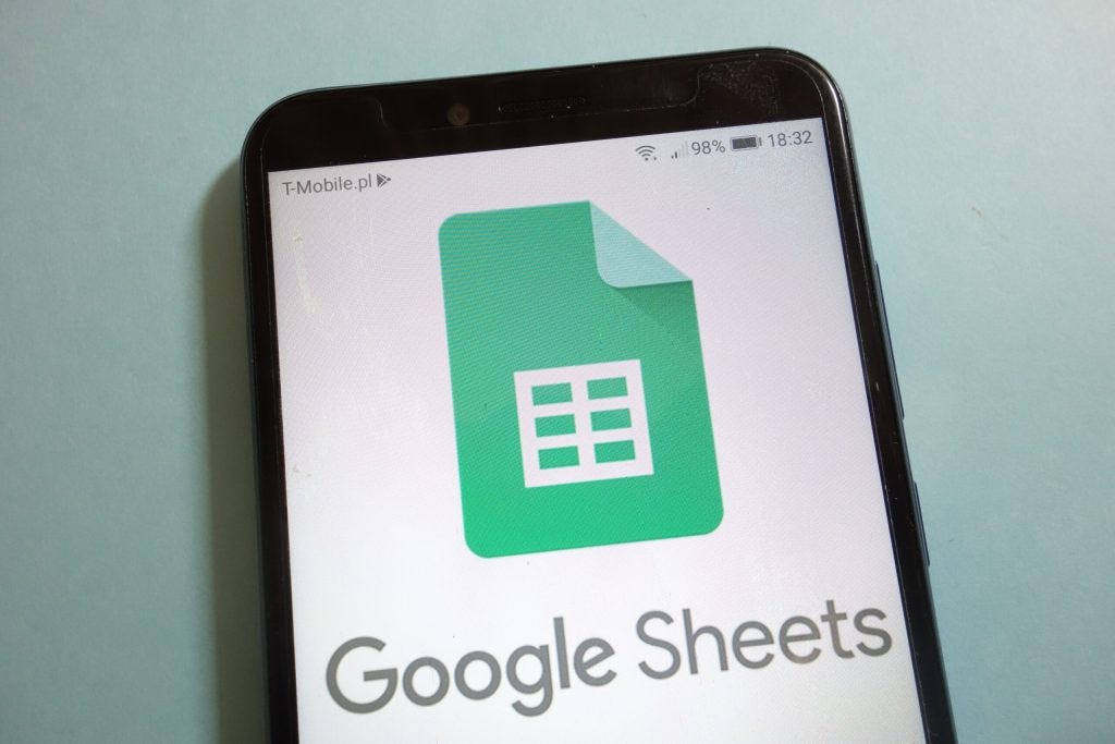 Black iPad displaying Google Sheets logo