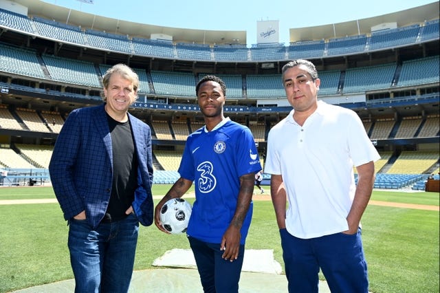 <p>New signing Raheem Sterling with Chelsea co-owners Todd Boehly and Behdad Eghbali</p>