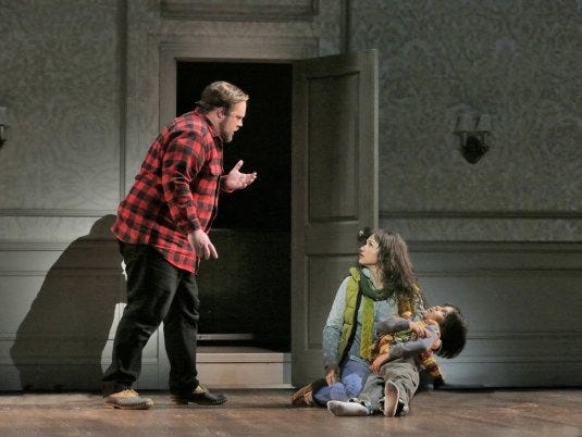 This Thursday, May 5, 2016 photo released by the Minnesota Opera shows, Brian Mulligan as Jack Torrance, from left, Kelly Kaduce as Wendy Torrance and Alejandro Vega as Danny Torrance in the MN Opera New Works Initiative production of Stephen King’s "The Shining," at the Ordway Center for the Performing Arts in St. Paul, Minn. (Ken Howard/Minnesota Opera via AP)