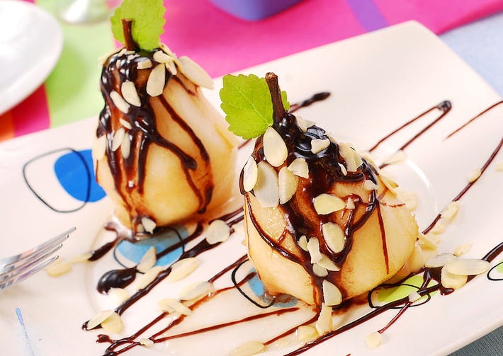 Pears with Chocolate Drizzle and Sliced Almonds