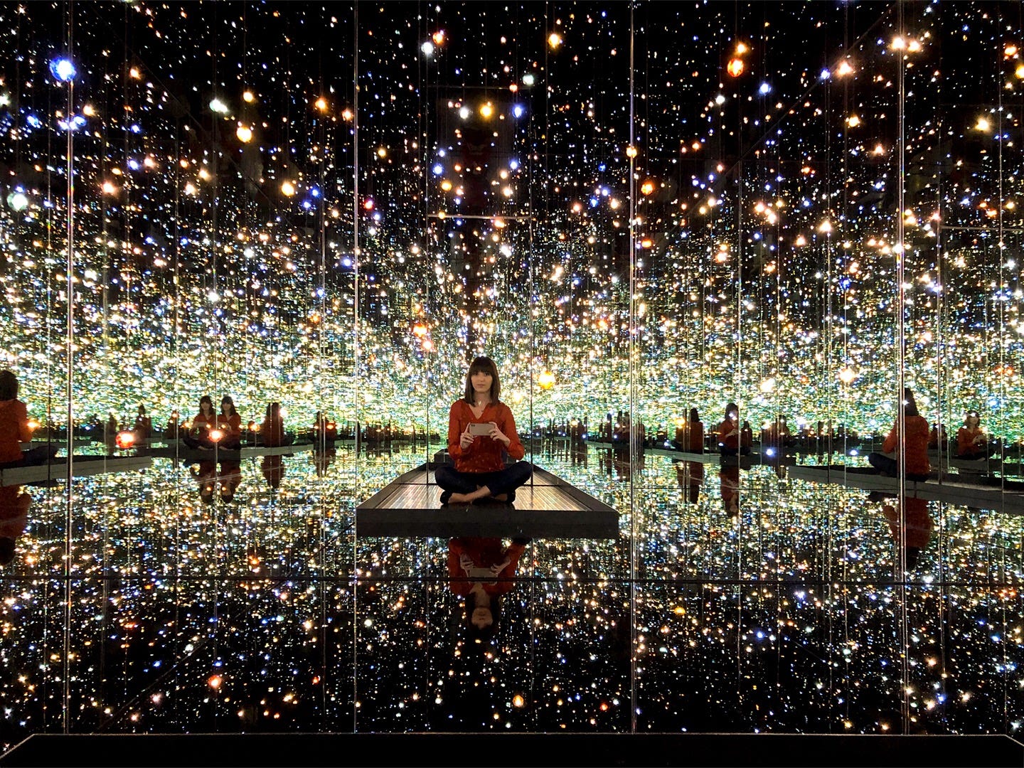 Katelyn inside The Souls of Millions of Lightyears Away (Yayoi Kusama, 2014)