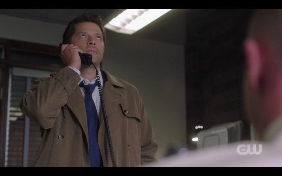 Long shot of Castiel on phone with Dean Winchester SPN 1506