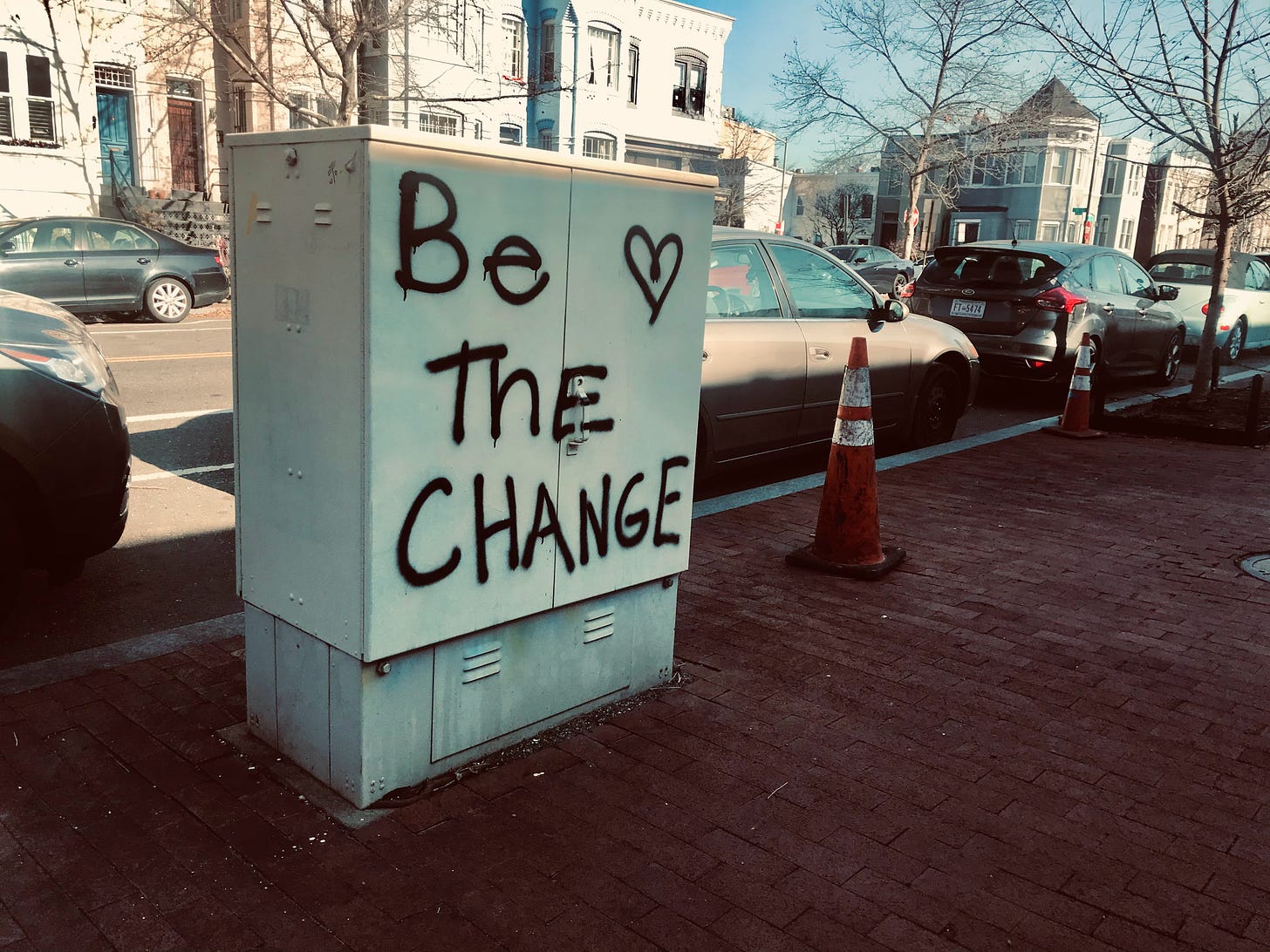 Be the change painted on a street utility box