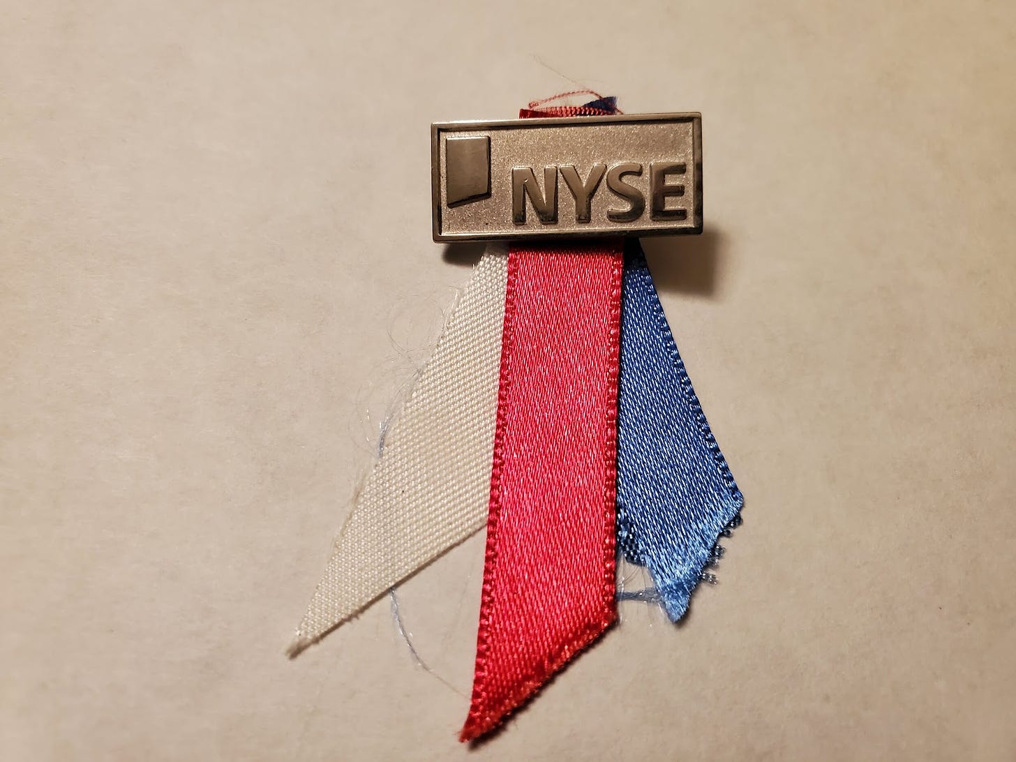 There was not enough time to create special lapel pins, so our events colleagues affixed ribbons to thousands of exchange pins so that everyone could wear the colors when the markets reopened on Sept. 17.
