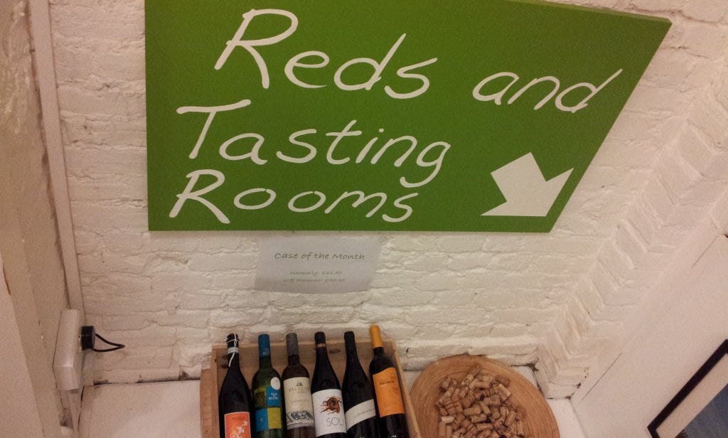 Dept stores have changing rooms, why shouldn't wine shops have tasting rooms?