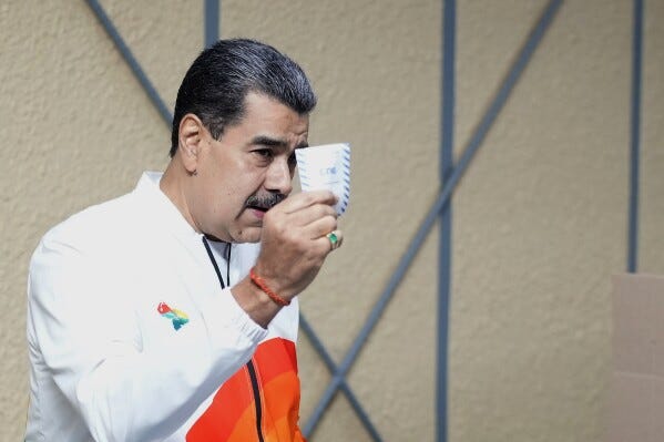 Le président Vénézuélien Nicolas Maduro vote lors du référendum sur l’Essequibo (AP Photo/Matias Delacroix)