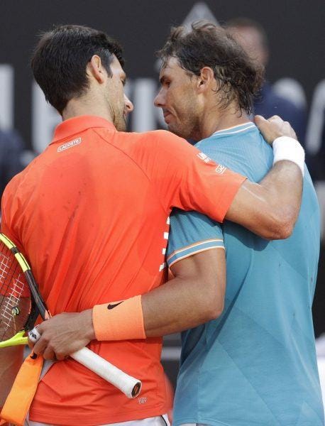 novak djokovic hugging rafael nadal win at italian open 2019 images