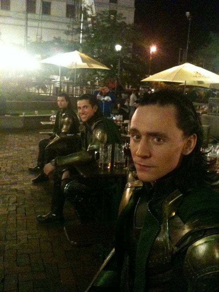 It takes a few men to tackle Tom Hiddleston's Loki