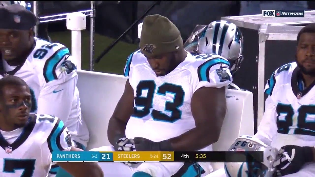 Panthers Lineman Gets Caught Sleeping on the Sideline - FanBuzz