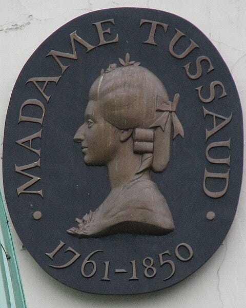 A plaque of Madame Tussaud in front of her wax museum in London