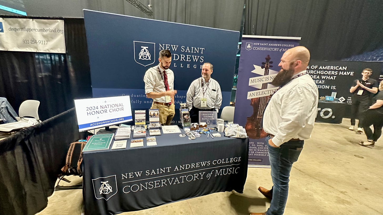New Saint Andrews College booth at Sing 2023 Conference.