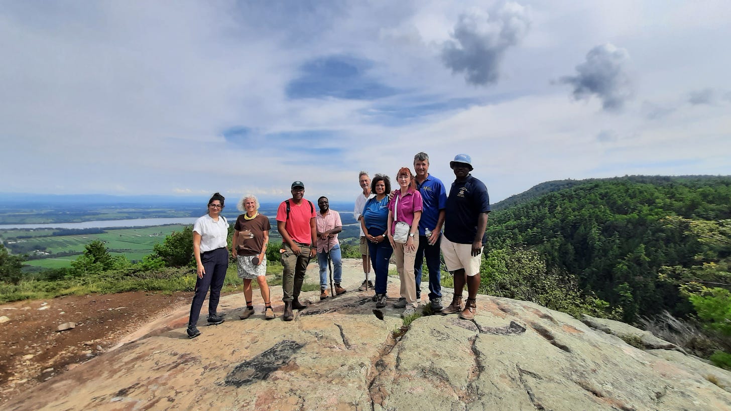 Members of the Black, Puerto Rican, Hispanic, and Asian Legislative Caucus join CATS Executive Director Chris Maron and Adirondack Council supporters at the top of Coot Hill overlooking Lake Champlain