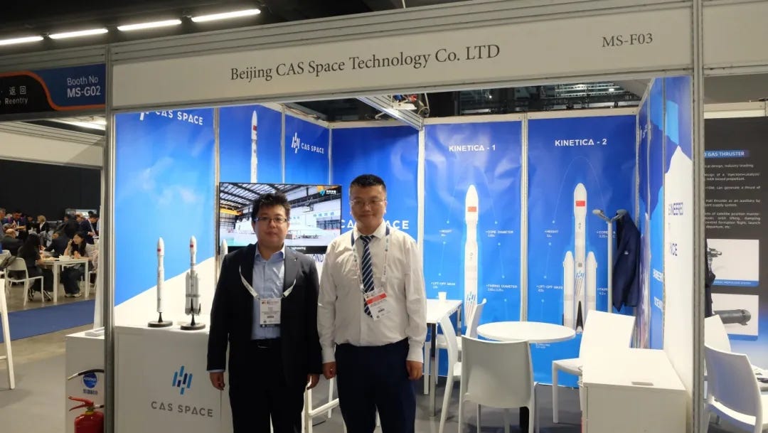 CAS Space’s booth at the congress with two of the company’s representatives.
