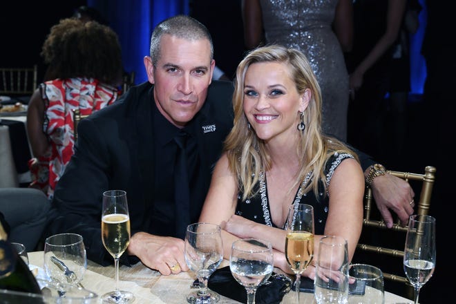 Jim Toth and Reese Witherspoon attend the Critics' Choice Awards at on Jan. 11, 2018 in Santa Monica, California.
