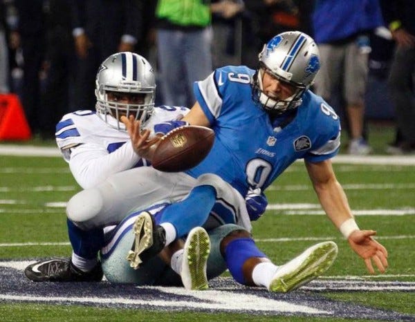 demarcus lawrence strips matthew stafford bulge nfl 2015 wild card images