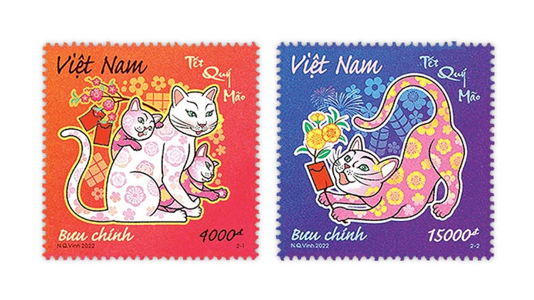 Two Vietnamese stamps show cats celebrating the new year