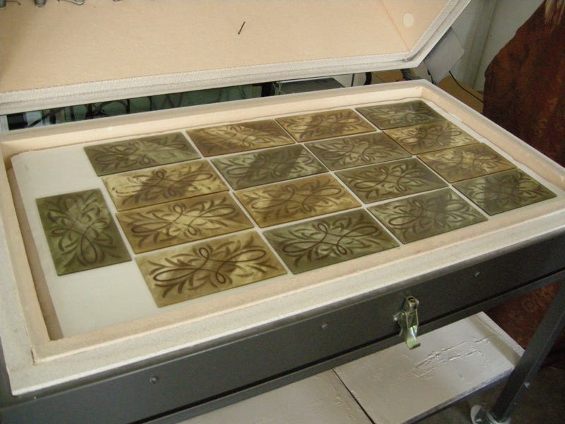 Kiln tray with paper