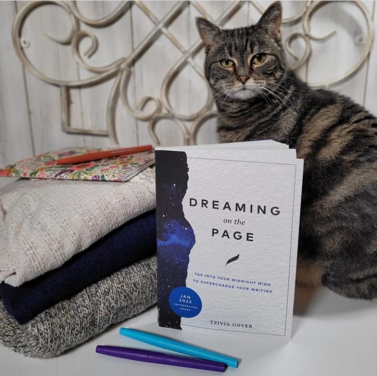Cats who read read Dreaming on the Page