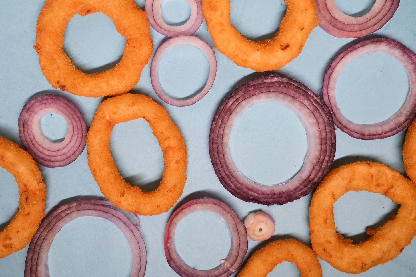 An assortment of onion layers and onion rings.