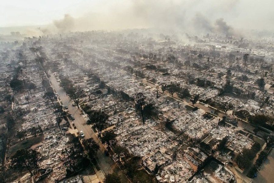 photo of smoldering neighborhood following the Pacific Palisades fire