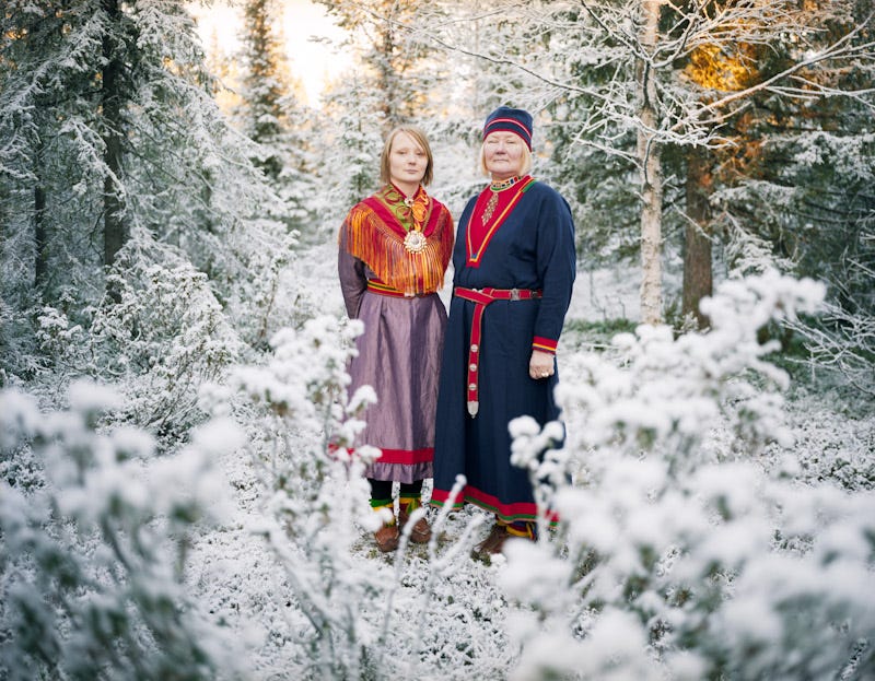 Sámi women in Sweden wear traditional fringed and appliquéd costumes specific to their region. © Erika Larsen