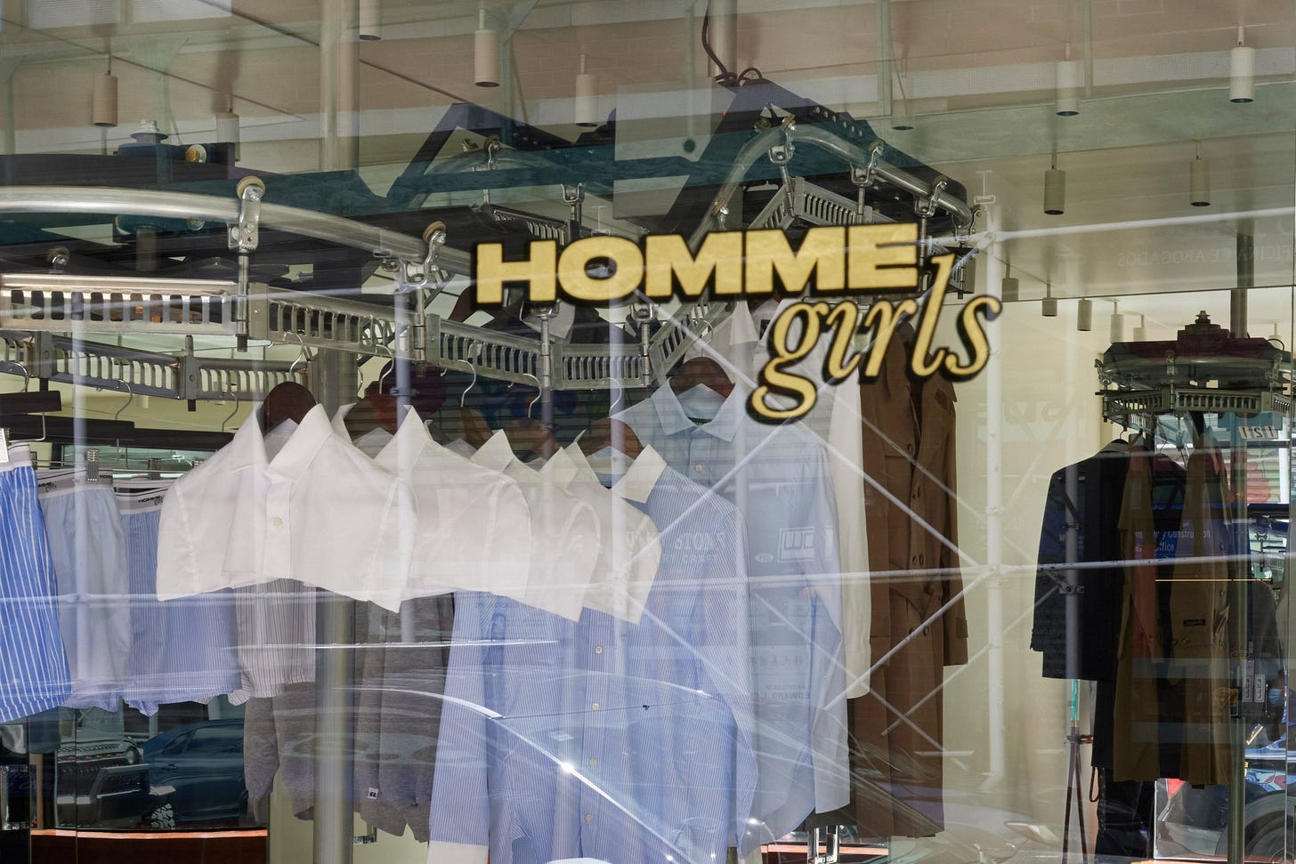 Image may contain Boutique Shop Adult Person Wedding Shopping Mall Car Transportation and Vehicle