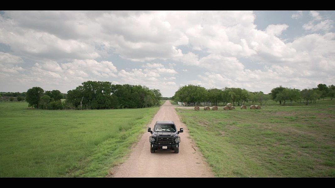 Cordell Walker with Cassie driving truck down Texas dirt road 3.5.