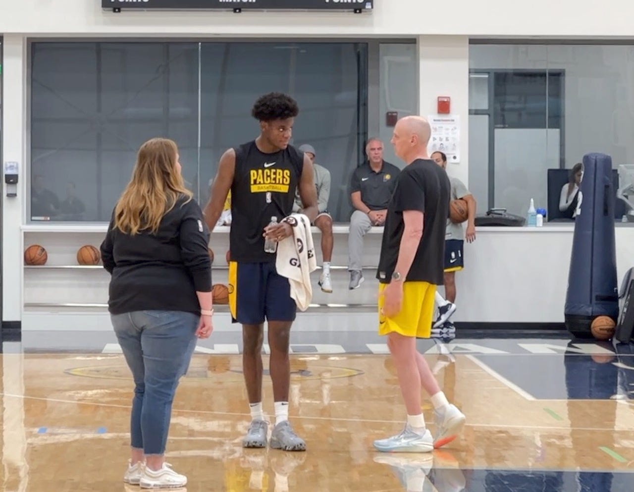 Taylor Hendricks talks with coach Rick Carlisle after his Pacers workout.