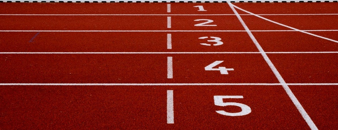 running field during daytime running field during daytime